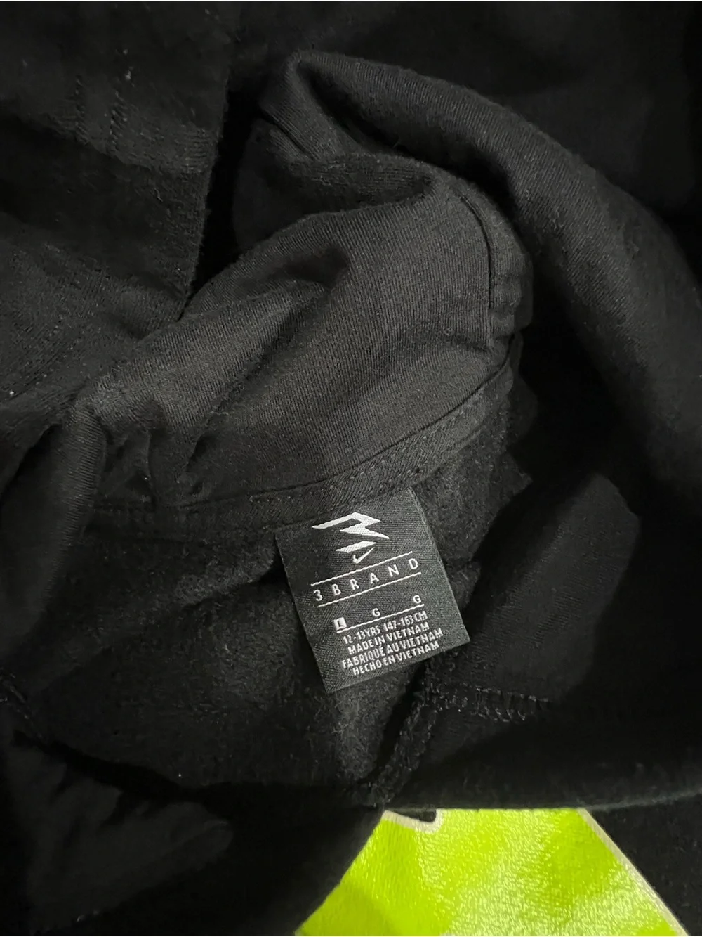 Nike Kids Black Hoodie with Neon Yellow Graphic